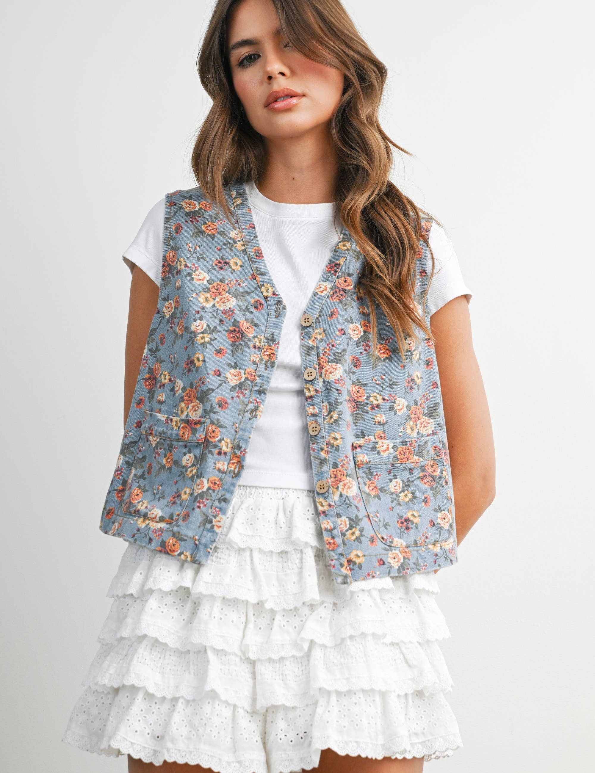 floral tie-front vest, cotton floral vest, women's floral vest, blue floral vest, tie-front vest, cottagecore vest, vintage inspired vest, layering vest, sleeveless floral top, fall layering piece, women's boutique vest, west of may boutique