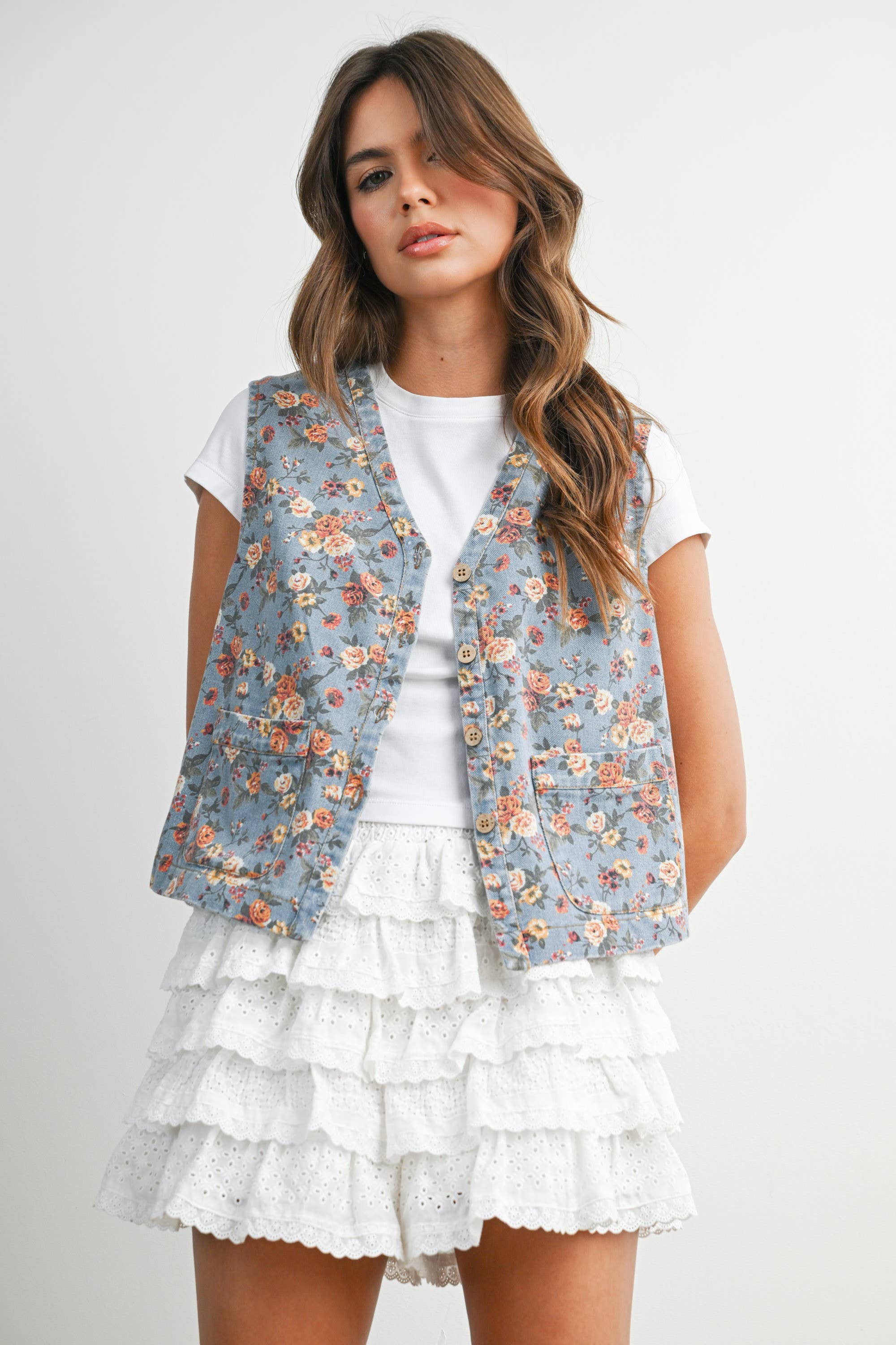 floral tie-front vest, cotton floral vest, women's floral vest, blue floral vest, tie-front vest, cottagecore vest, vintage inspired vest, layering vest, sleeveless floral top, fall layering piece, women's boutique vest, west of may boutique