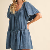 denim romper
flutter sleeve romper
lightweight denim romper
button front romper
drawstring waist romper
loose fit romper
mom friendly romper
casual summer romper
boutique denim romper
west of may romper