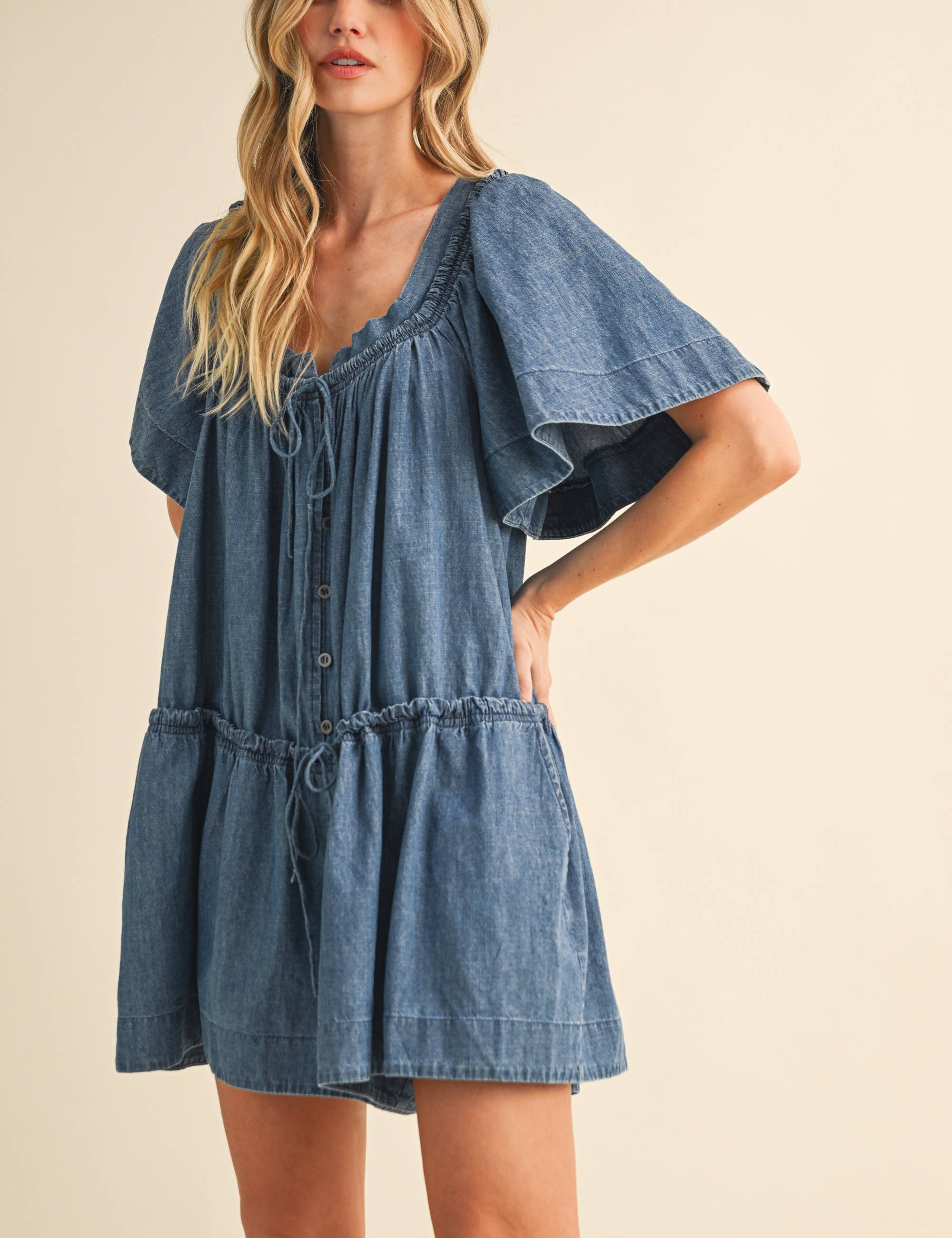 denim romper
flutter sleeve romper
lightweight denim romper
button front romper
drawstring waist romper
loose fit romper
mom friendly romper
casual summer romper
boutique denim romper
west of may romper