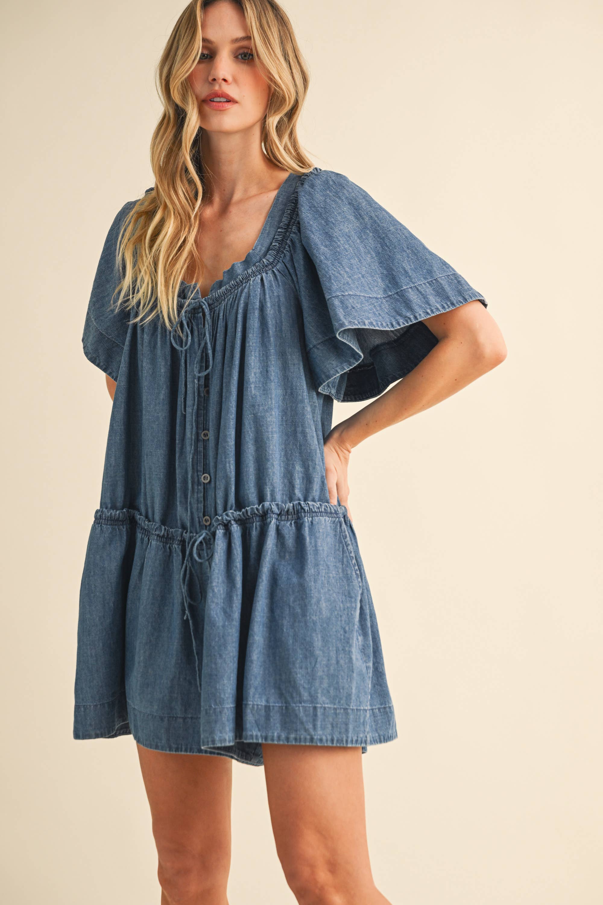 denim romper
flutter sleeve romper
lightweight denim romper
button front romper
drawstring waist romper
loose fit romper
mom friendly romper
casual summer romper
boutique denim romper
west of may romper