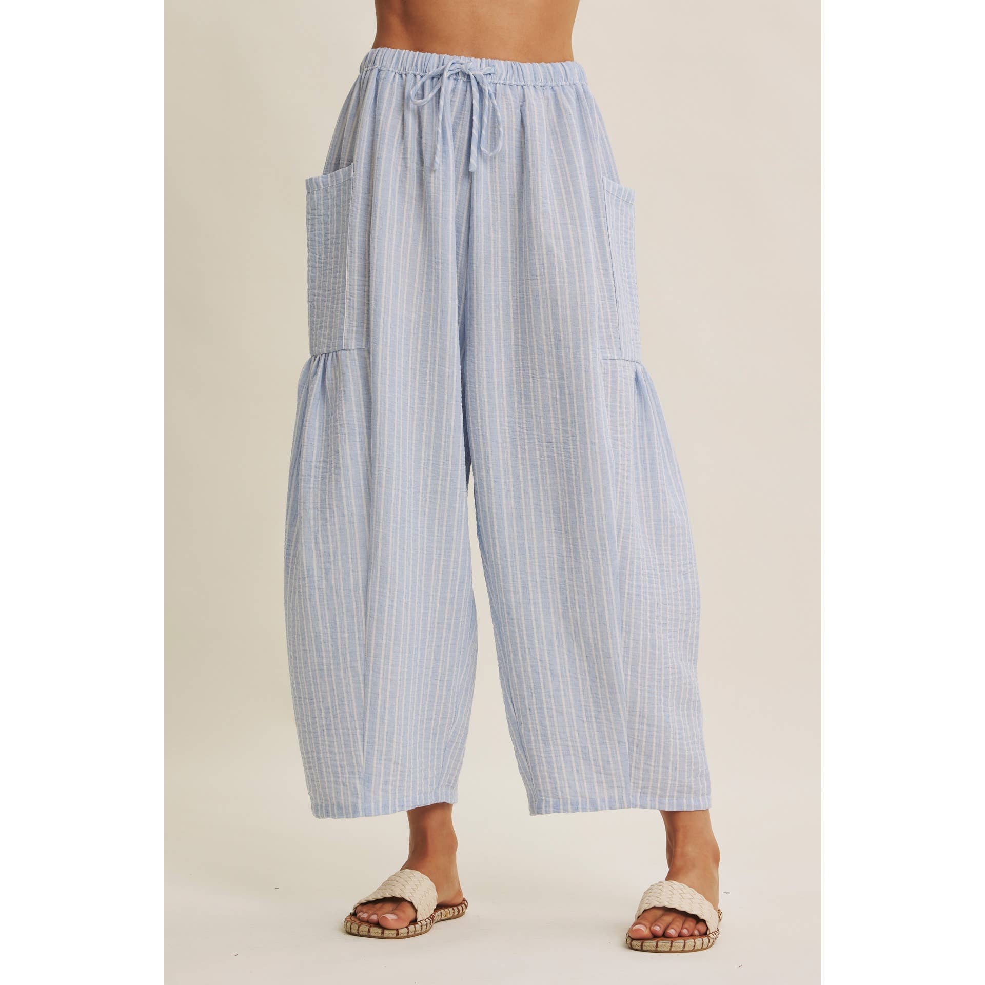 blue striped wide leg pants
coastal summer pants women
lightweight vacation pants
relaxed striped lounge pants
elastic waist wide leg pants
resort wear boutique pants
beach vacation outfit women
casual coastal style pants
striped summer trousers women
west of may spritz collection