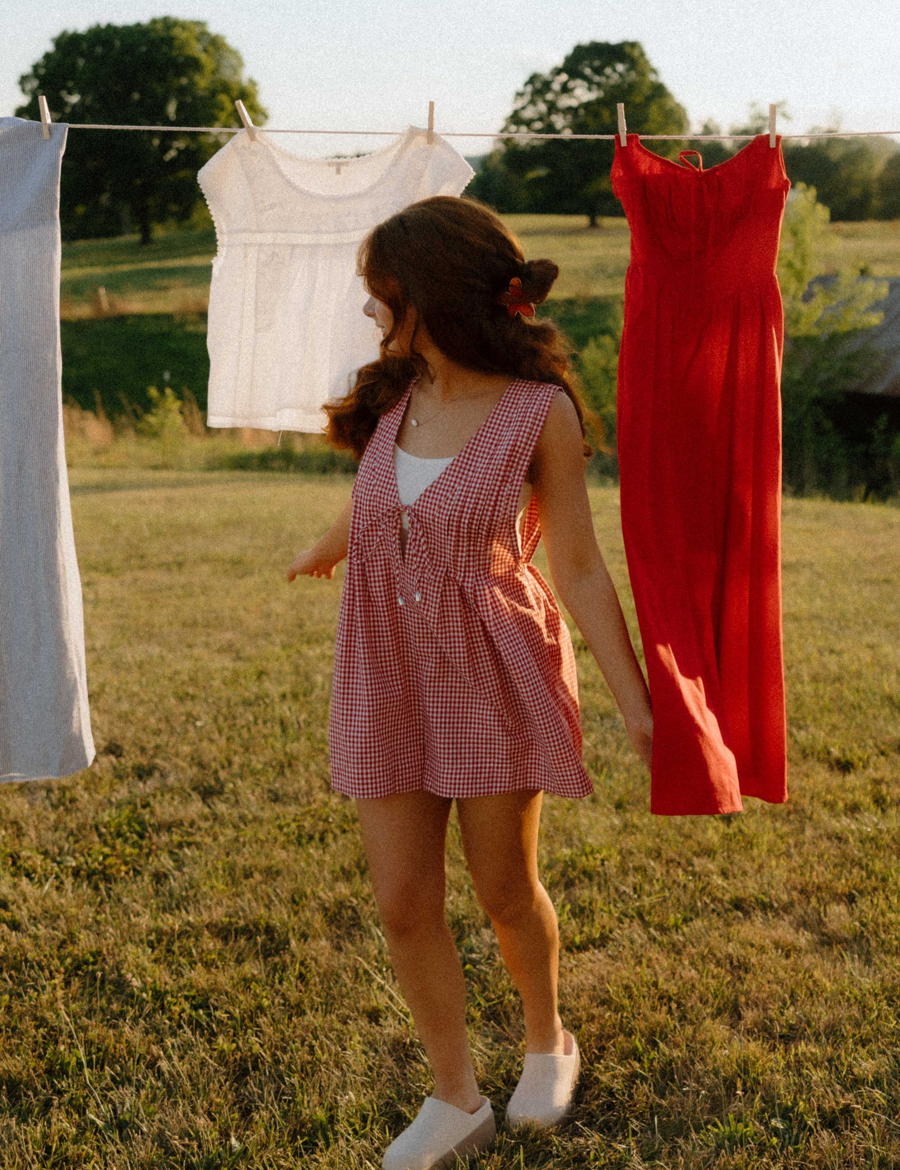 red gingham tie front romper
women's red gingham summer romper
sleeveless gingham romper with front ties
lightweight linen blend gingham romper
relaxed fit red check romper
americana inspired summer romper
red picnic gingham romper for women
casual sleeveless gingham playsuit
loose fit red gingham romper
vintage inspired gingham romper