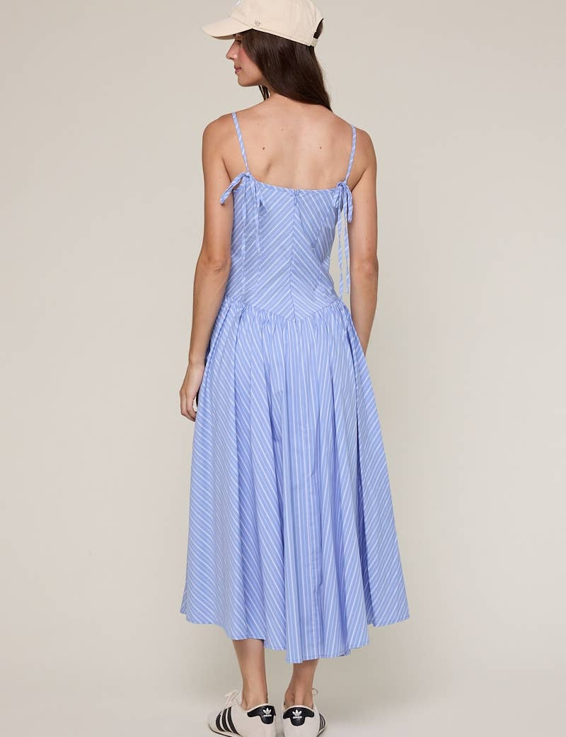 blue striped midi dress
pale blue summer dress
americana summer outfit
southern summer style
fit and flare midi dress
striped sundress for women
classic americana fashion
fourth of july outfit women
feminine summer midi dress
coastal countryside style
adjustable strap midi dress
blue and white striped dress
casual summer boutique dress
nostalgic summer fashion
east tennessee boutique clothing
summer picnic dress
farmhouse summer outfit
lightweight summer midi dress
romantic summer dress
countryside summer a