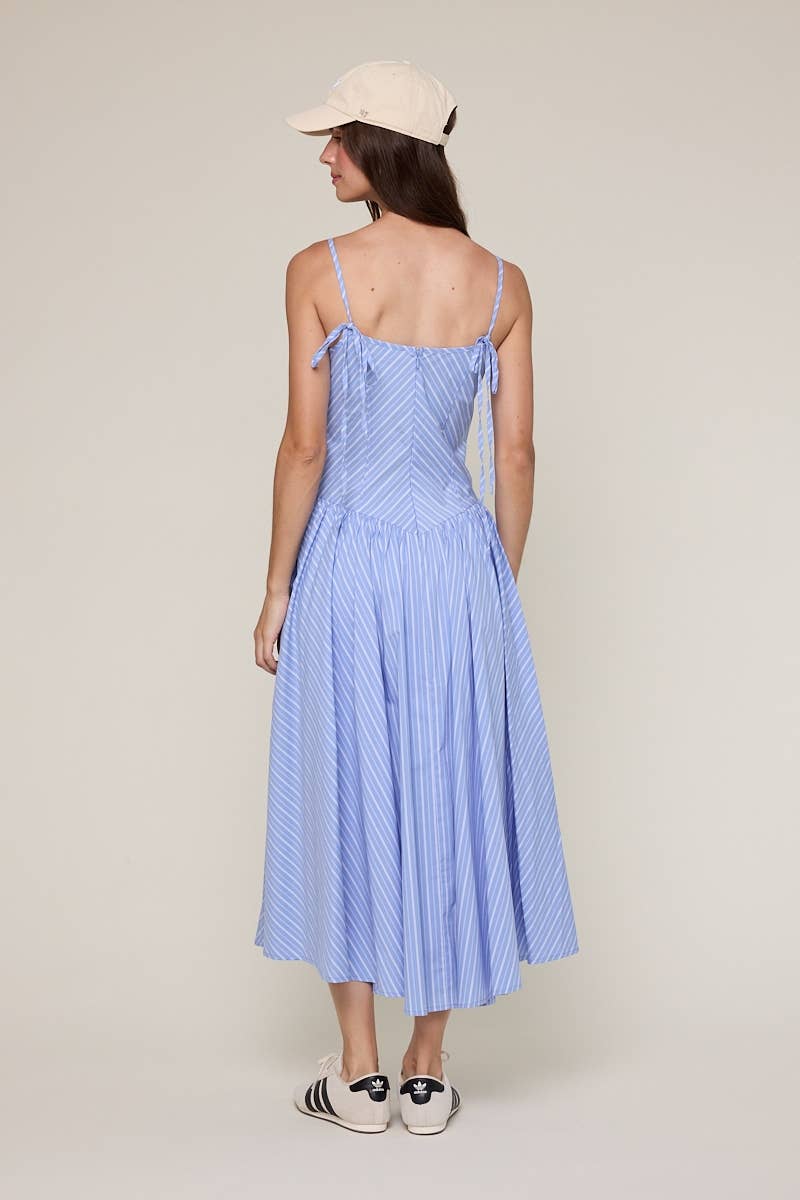 blue striped midi dress
pale blue summer dress
americana summer outfit
southern summer style
fit and flare midi dress
striped sundress for women
classic americana fashion
fourth of july outfit women
feminine summer midi dress
coastal countryside style
adjustable strap midi dress
blue and white striped dress
casual summer boutique dress
nostalgic summer fashion
east tennessee boutique clothing
summer picnic dress
farmhouse summer outfit
lightweight summer midi dress
romantic summer dress
countryside summer a