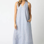 light blue linen maxi dress with v-neckline and side pockets
sleeveless 100% linen dress with relaxed a-line silhouette
coastal-inspired linen maxi dress in soft blue
lightweight linen summer dress with functional pockets
elevated casual linen dress for vacation and everyday wear
vacation dress
rich mom dress
high end linen dress
hamptons vacation dress
east coast vacation dress
flattering linen dress
flowy linen dress
linen dress for brunch
linen dress for baby shower
classy linen dress
old money linen 