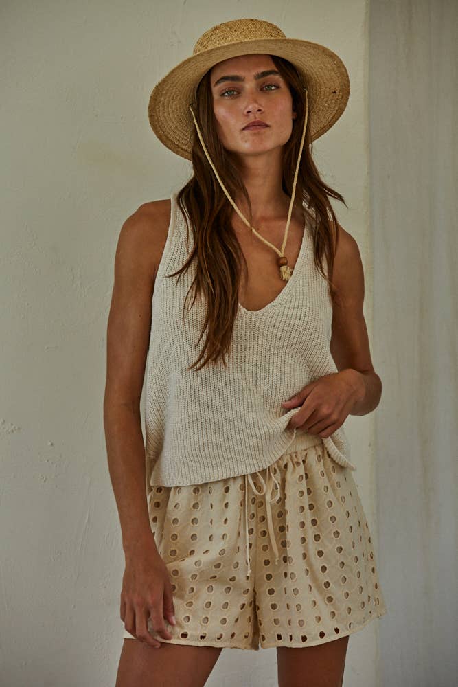 cream cotton sweater tank, v neck sweater tank, sleeveless cotton knit top, lightweight sweater tank, women's knit tank top, cream sleeveless sweater, relaxed fit sweater tank, cotton knit vest, neutral layering top, everyday sweater tank, side slit sweater tank, soft knit sleeveless top
