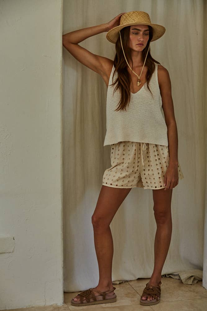 cream cotton sweater tank, v neck sweater tank, sleeveless cotton knit top, lightweight sweater tank, women's knit tank top, cream sleeveless sweater, relaxed fit sweater tank, cotton knit vest, neutral layering top, everyday sweater tank, side slit sweater tank, soft knit sleeveless top