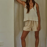 cream cotton sweater tank, v neck sweater tank, sleeveless cotton knit top, lightweight sweater tank, women's knit tank top, cream sleeveless sweater, relaxed fit sweater tank, cotton knit vest, neutral layering top, everyday sweater tank, side slit sweater tank, soft knit sleeveless top