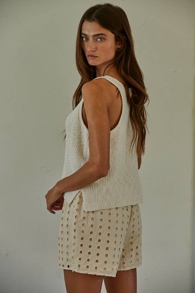 cream cotton sweater tank, v neck sweater tank, sleeveless cotton knit top, lightweight sweater tank, women's knit tank top, cream sleeveless sweater, relaxed fit sweater tank, cotton knit vest, neutral layering top, everyday sweater tank, side slit sweater tank, soft knit sleeveless top