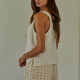 cream cotton sweater tank, v neck sweater tank, sleeveless cotton knit top, lightweight sweater tank, women's knit tank top, cream sleeveless sweater, relaxed fit sweater tank, cotton knit vest, neutral layering top, everyday sweater tank, side slit sweater tank, soft knit sleeveless top