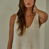 cream cotton sweater tank, v neck sweater tank, sleeveless cotton knit top, lightweight sweater tank, women's knit tank top, cream sleeveless sweater, relaxed fit sweater tank, cotton knit vest, neutral layering top, everyday sweater tank, side slit sweater tank, soft knit sleeveless top