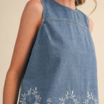 embroidered denim tank
chambray embroidered top
sleeveless denim blouse
blue embroidered tank top
floral embroidered chambray top
americana summer outfit
county fair outfit
matching denim set
lightweight denim top
embroidered summer blouse
boutique women's clothing
casual summer tank
heirloom inspired embroidery
southern summer fashion
denim summer top
