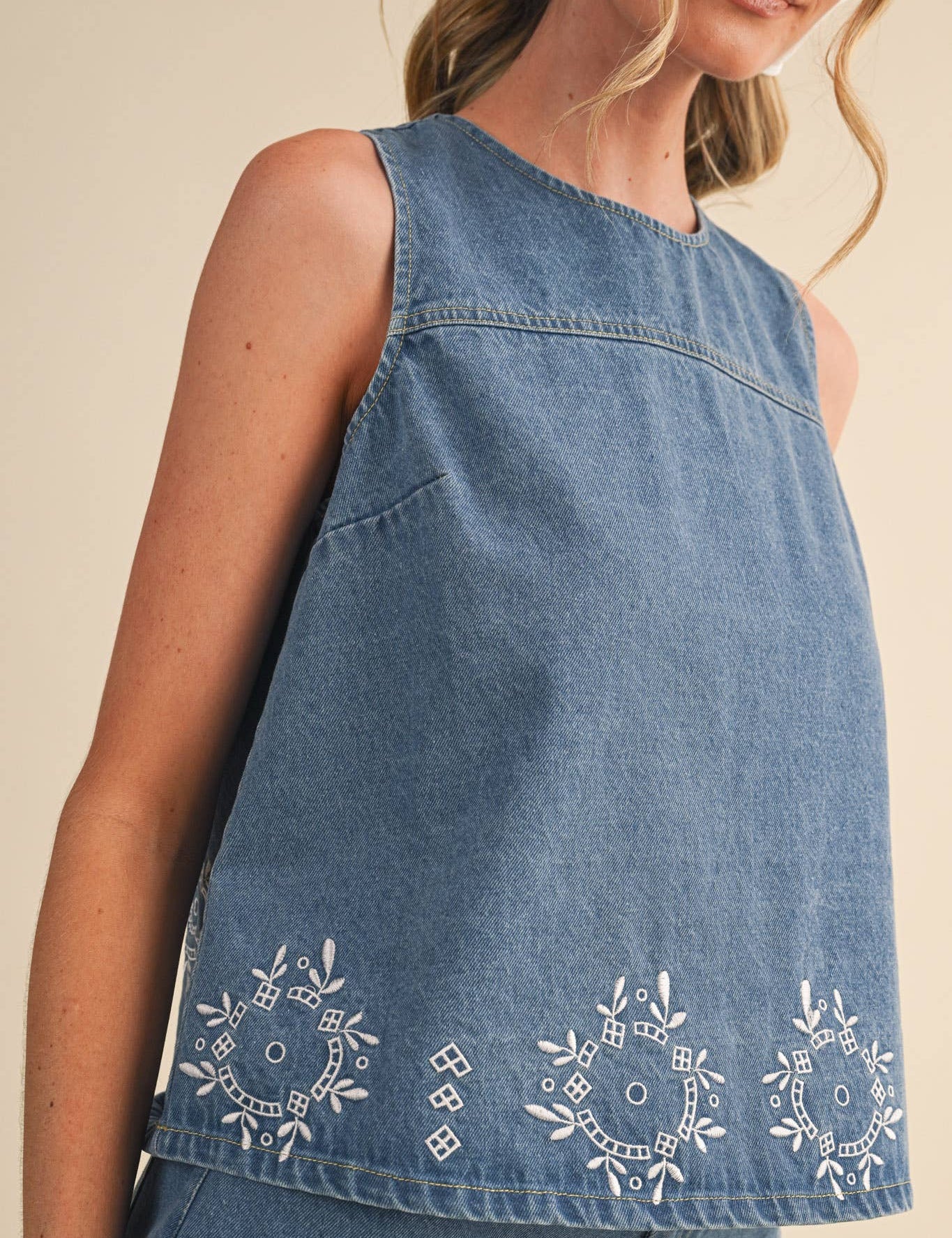 embroidered denim tank
chambray embroidered top
sleeveless denim blouse
blue embroidered tank top
floral embroidered chambray top
americana summer outfit
county fair outfit
matching denim set
lightweight denim top
embroidered summer blouse
boutique women's clothing
casual summer tank
heirloom inspired embroidery
southern summer fashion
denim summer top