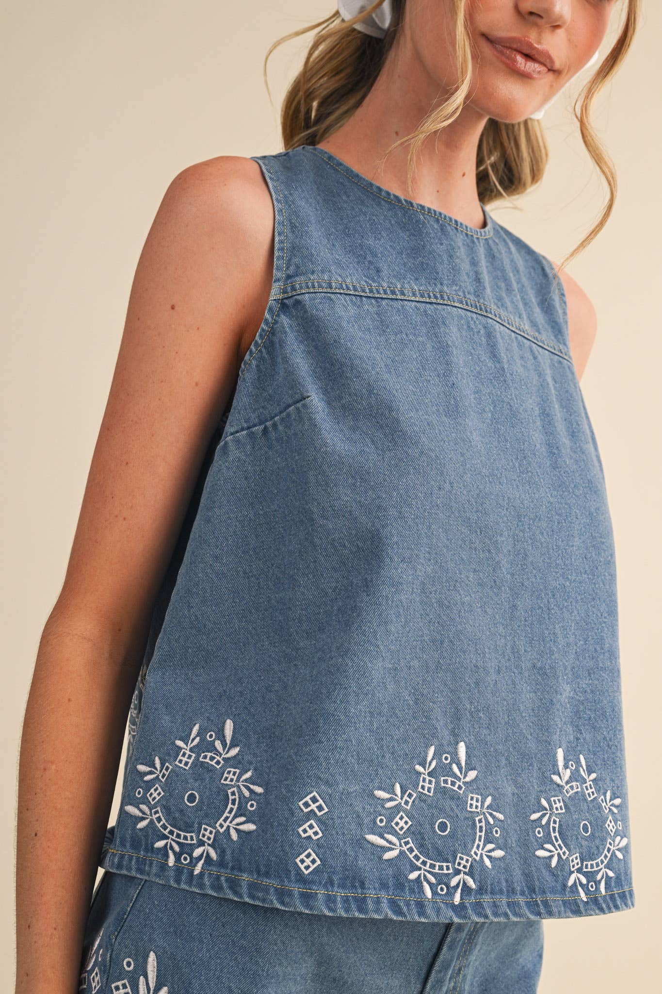 embroidered denim tank
chambray embroidered top
sleeveless denim blouse
blue embroidered tank top
floral embroidered chambray top
americana summer outfit
county fair outfit
matching denim set
lightweight denim top
embroidered summer blouse
boutique women's clothing
casual summer tank
heirloom inspired embroidery
southern summer fashion
denim summer top