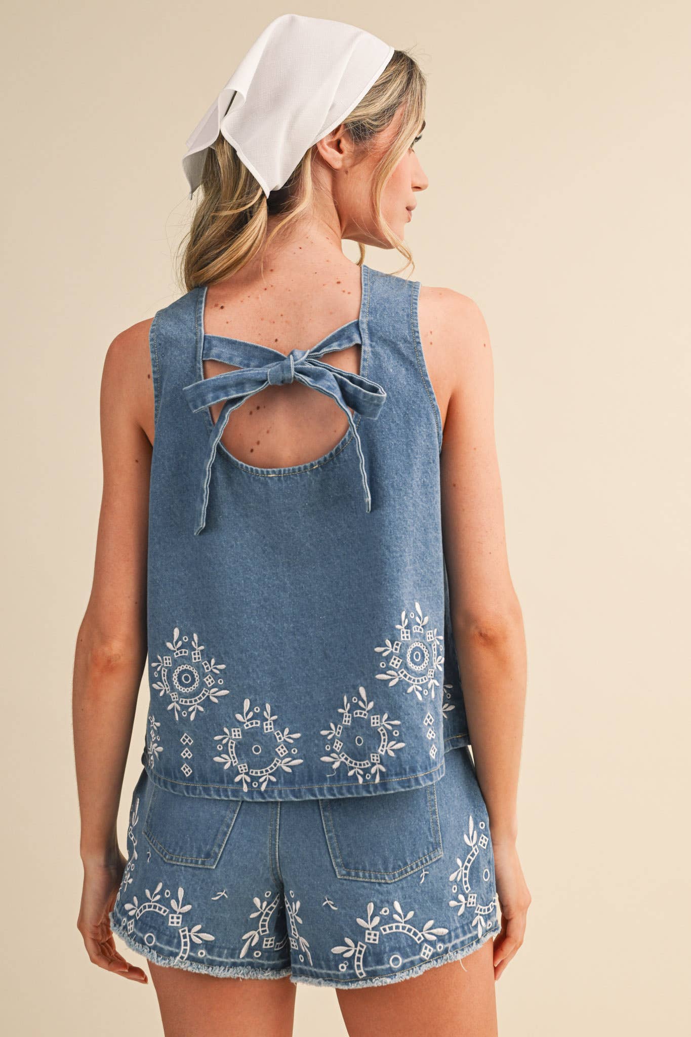 embroidered denim tank
chambray embroidered top
sleeveless denim blouse
blue embroidered tank top
floral embroidered chambray top
americana summer outfit
county fair outfit
matching denim set
lightweight denim top
embroidered summer blouse
boutique women's clothing
casual summer tank
heirloom inspired embroidery
southern summer fashion
denim summer top