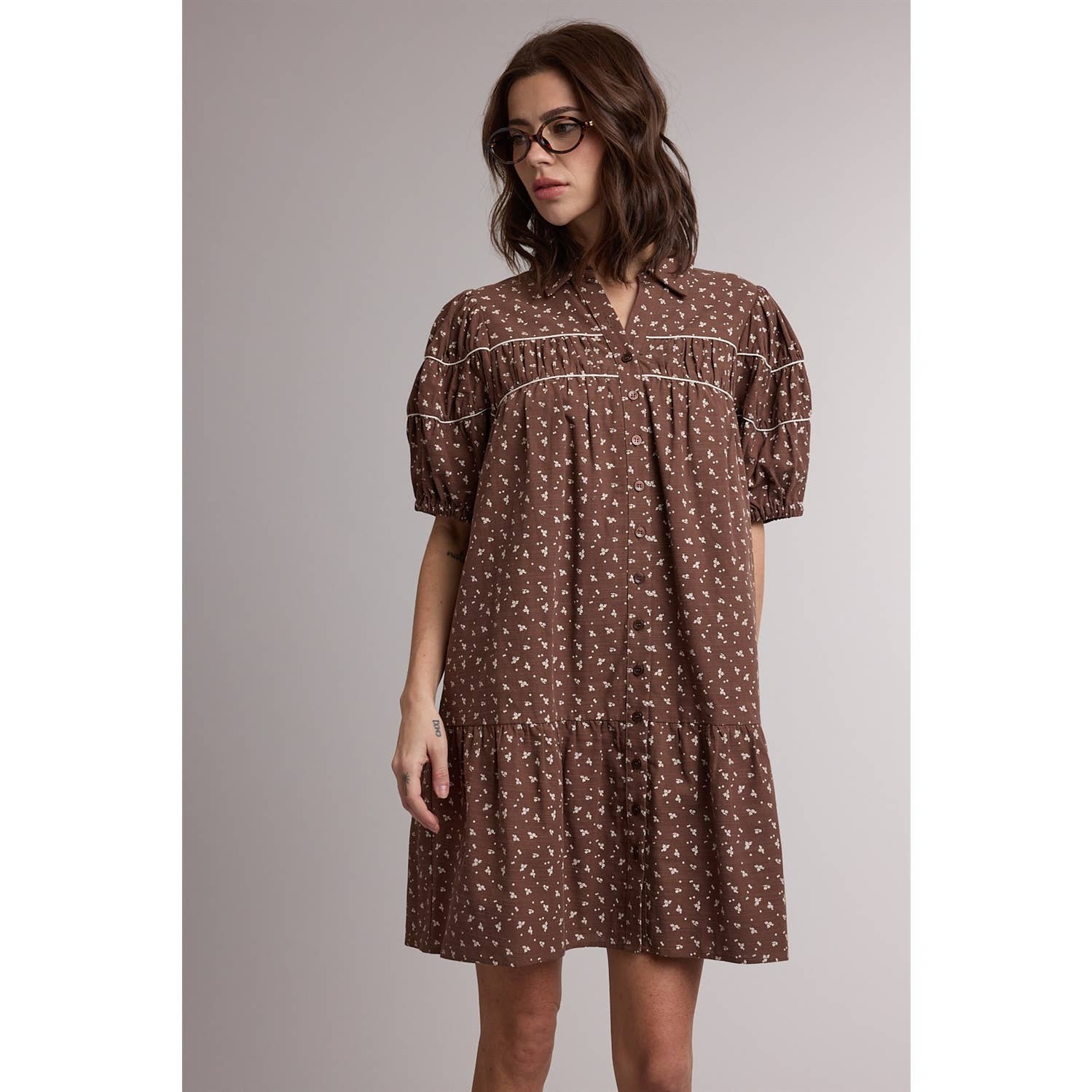 women's brown floral dress, brown floral mini dress, western floral dress, western mini dress, cowgirl fall dress, brown fall dress, puff sleeve mini dress, button front floral dress, collared mini dress, loose fit mini dress, women's casual fall dress, fall dress with cowboy boots, western women's clothing, western boutique dress, women's fall boutique clothing, brown ditsy floral dress, boho western dress, cotton linen blend dress, east tennessee women's boutique, west of may boutique