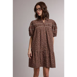 women's brown floral dress, brown floral mini dress, western floral dress, western mini dress, cowgirl fall dress, brown fall dress, puff sleeve mini dress, button front floral dress, collared mini dress, loose fit mini dress, women's casual fall dress, fall dress with cowboy boots, western women's clothing, western boutique dress, women's fall boutique clothing, brown ditsy floral dress, boho western dress, cotton linen blend dress, east tennessee women's boutique, west of may boutique