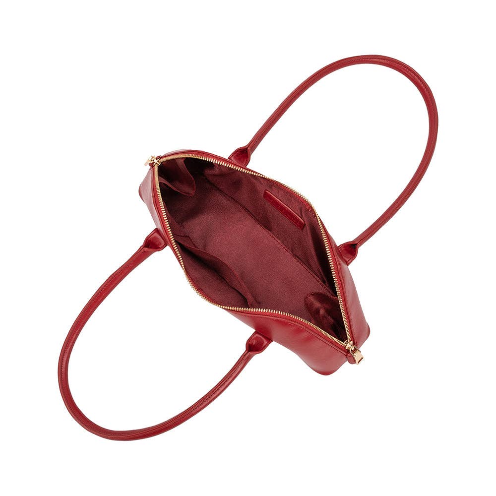 interior pockets of small red handbag