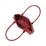 interior pockets of small red handbag
