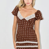 women's brown polka dot dress, chocolate brown mini dress, brown polka dot mini dress, lace trim mini dress, western mini dress, cowgirl mini dress, western date night dress, brown and cream dress, sweetheart neckline dress, puff sleeve mini dress, fitted fall mini dress, fall dress with cowboy boots, country concert outfit women, western concert dress, women's western fall outfit, vintage western dress, lace western dress, chocolate brown fall dress, women's boutique mini dress, western women's clothing