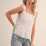 lace trim tank top
white cotton tank top
square neck tank
lace strap tank
feminine summer top
cotton lace blouse
pintuck tank top
white summer blouse
boho cotton tank
romantic summer top
lightweight cotton blouse
sleeveless lace top
boutique women's clothing
white casual top
cotton tank with lace
summer outfit essential
delicate lace detail top
women's cotton blouse
vacation outfit top
everyday feminine top
