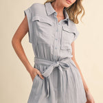 blue utility romper women
collared belted romper
cargo pocket summer romper
lightweight vacation romper
resort wear romper women
casual chic one piece outfit
travel outfit romper women
blue sleeveless romper boutique
elevated utility romper
west of may spritz collection