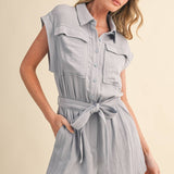 blue utility romper women
collared belted romper
cargo pocket summer romper
lightweight vacation romper
resort wear romper women
casual chic one piece outfit
travel outfit romper women
blue sleeveless romper boutique
elevated utility romper
west of may spritz collection