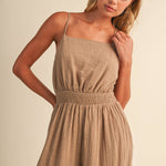 linen blend jumpsuit, tan jumpsuit women, bow back jumpsuit, smocked waist jumpsuit, square neck jumpsuit, relaxed fit one piece outfit, boho jumpsuit, wide leg jumpsuit, neutral summer jumpsuit, lightweight vacation outfit