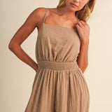 linen blend jumpsuit, tan jumpsuit women, bow back jumpsuit, smocked waist jumpsuit, square neck jumpsuit, relaxed fit one piece outfit, boho jumpsuit, wide leg jumpsuit, neutral summer jumpsuit, lightweight vacation outfit