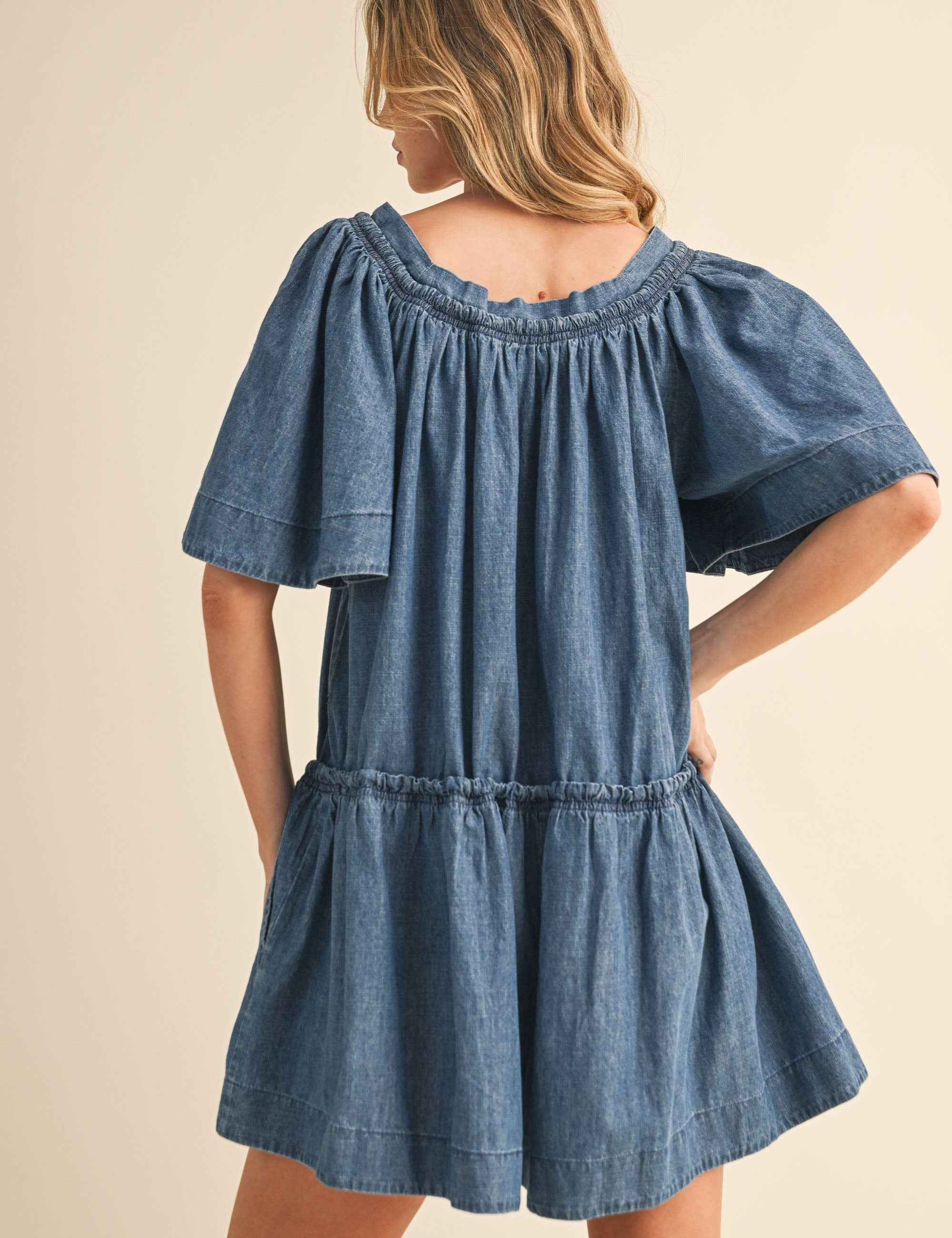 denim romper
flutter sleeve romper
lightweight denim romper
button front romper
drawstring waist romper
loose fit romper
mom friendly romper
casual summer romper
boutique denim romper
west of may romper