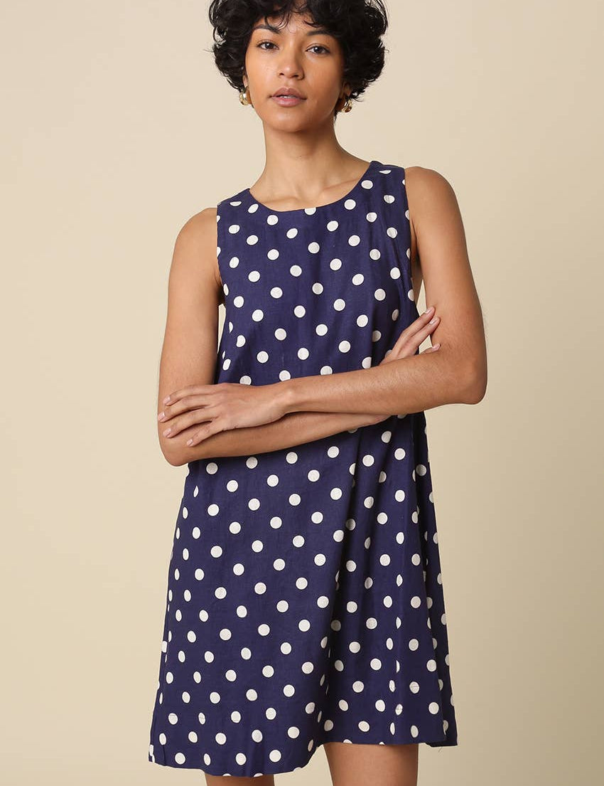 navy polka dot dress
sleeveless mini dress
linen blend dress
navy summer dress
polka dot shift dress
classic summer dress
linen rayon dress
women's sleeveless dress
vintage inspired dress
casual summer outfit
navy and white polka dot dress
lightweight summer dress
boutique women's clothing
timeless mini dress
vacation dress women
classic americana style
everyday summer dress
round neck mini dress
coastal summer outfit
women's linen blend dress