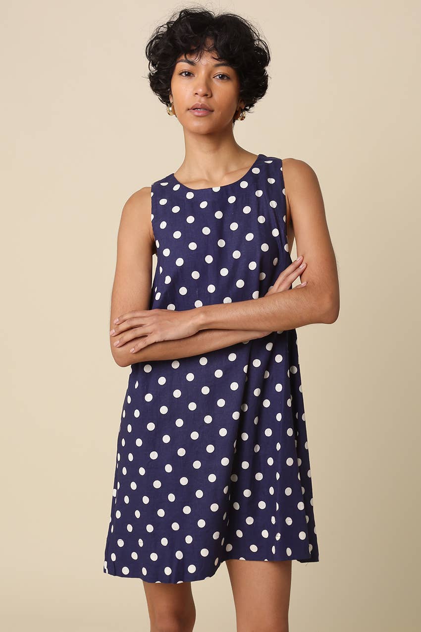 navy polka dot dress
sleeveless mini dress
linen blend dress
navy summer dress
polka dot shift dress
classic summer dress
linen rayon dress
women's sleeveless dress
vintage inspired dress
casual summer outfit
navy and white polka dot dress
lightweight summer dress
boutique women's clothing
timeless mini dress
vacation dress women
classic americana style
everyday summer dress
round neck mini dress
coastal summer outfit
women's linen blend dress