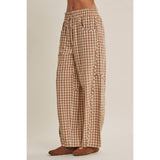 relaxed brown and cream gingham barrel pants in 100% cotton with an elastic drawstring waist, curved seaming and oversized pockets.