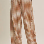 relaxed brown and cream gingham barrel pants in 100% cotton with an elastic drawstring waist, curved seaming and oversized pockets.