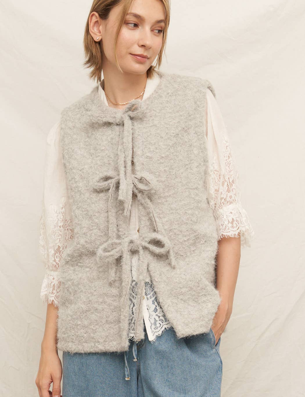 gray sweater vest with front ties