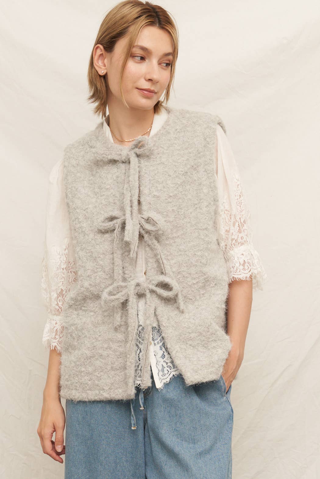 gray sweater vest with front ties