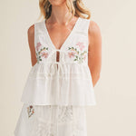 embroidered floral vest, tie front peplum top, white embroidered blouse, cottagecore vest top, lace trim sleeveless top, floral embroidered tank, boho peplum vest, embroidered cotton top, feminine tie front blouse, white summer vest