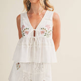embroidered floral vest, tie front peplum top, white embroidered blouse, cottagecore vest top, lace trim sleeveless top, floral embroidered tank, boho peplum vest, embroidered cotton top, feminine tie front blouse, white summer vest