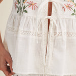 embroidered floral vest, tie front peplum top, white embroidered blouse, cottagecore vest top, lace trim sleeveless top, floral embroidered tank, boho peplum vest, embroidered cotton top, feminine tie front blouse, white summer vest