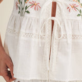 embroidered floral vest, tie front peplum top, white embroidered blouse, cottagecore vest top, lace trim sleeveless top, floral embroidered tank, boho peplum vest, embroidered cotton top, feminine tie front blouse, white summer vest