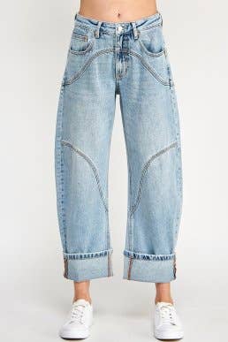 light wash high rise barrel jeans with curved statement seams and wide cuffed hems. available in sizes 1–15 and 1xl–3xl.