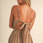 linen blend jumpsuit, tan jumpsuit women, bow back jumpsuit, smocked waist jumpsuit, square neck jumpsuit, relaxed fit one piece outfit, boho jumpsuit, wide leg jumpsuit, neutral summer jumpsuit, lightweight vacation outfit