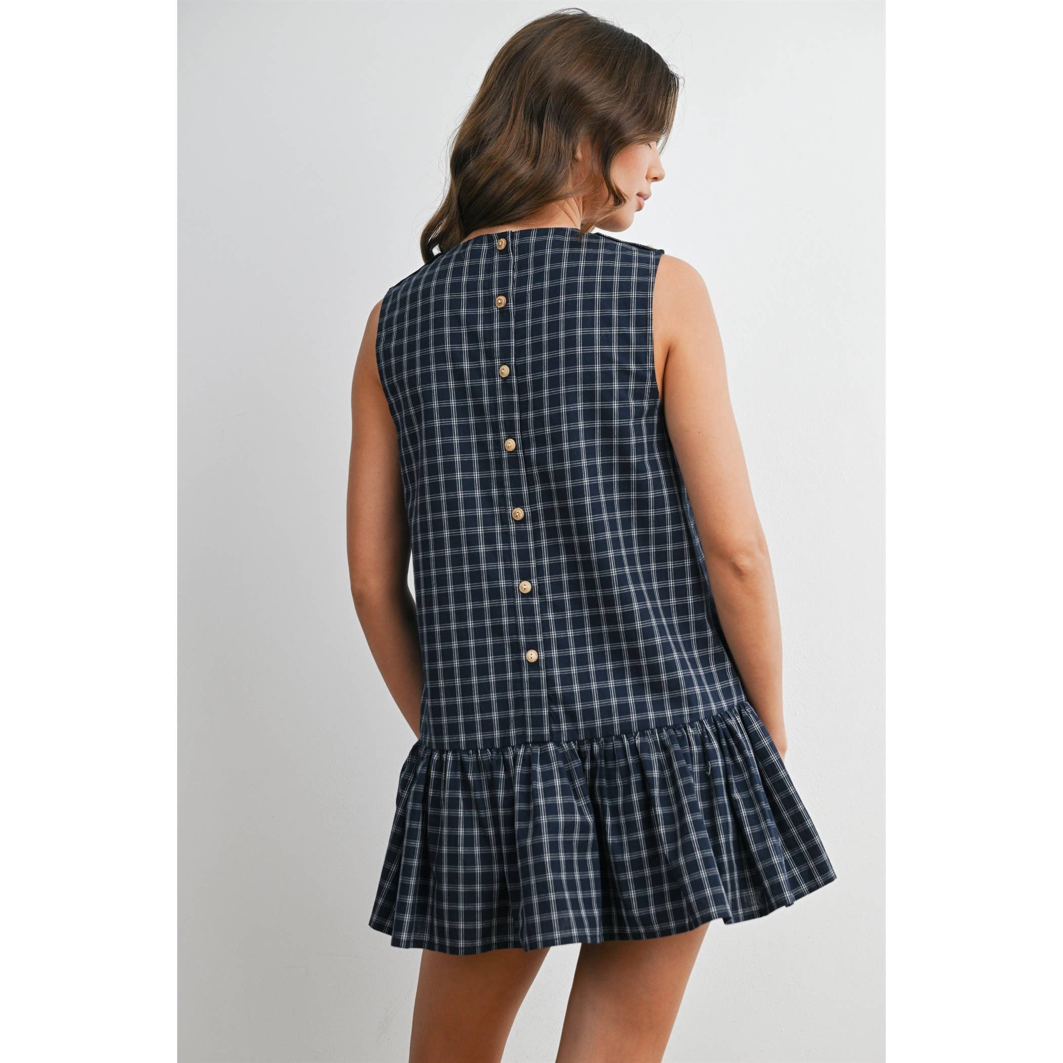 plaid mini dress, navy plaid dress, sleeveless plaid dress, button back dress, flounce hem dress, preppy plaid dress, fall mini dress, classic plaid dress, women's boutique dress, fall fashion, west of may boutique