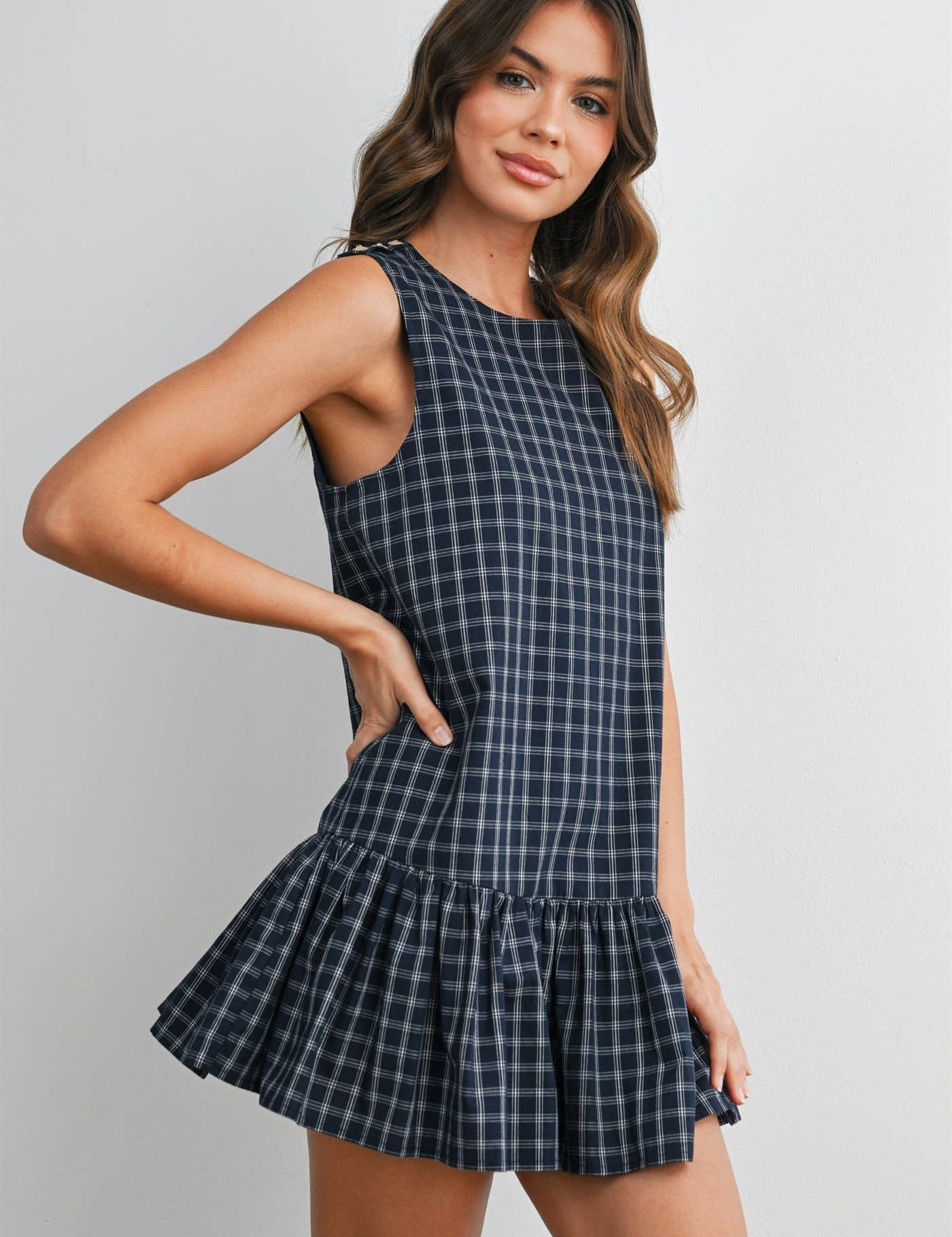 plaid mini dress, navy plaid dress, sleeveless plaid dress, button back dress, flounce hem dress, preppy plaid dress, fall mini dress, classic plaid dress, women's boutique dress, fall fashion, west of may boutique