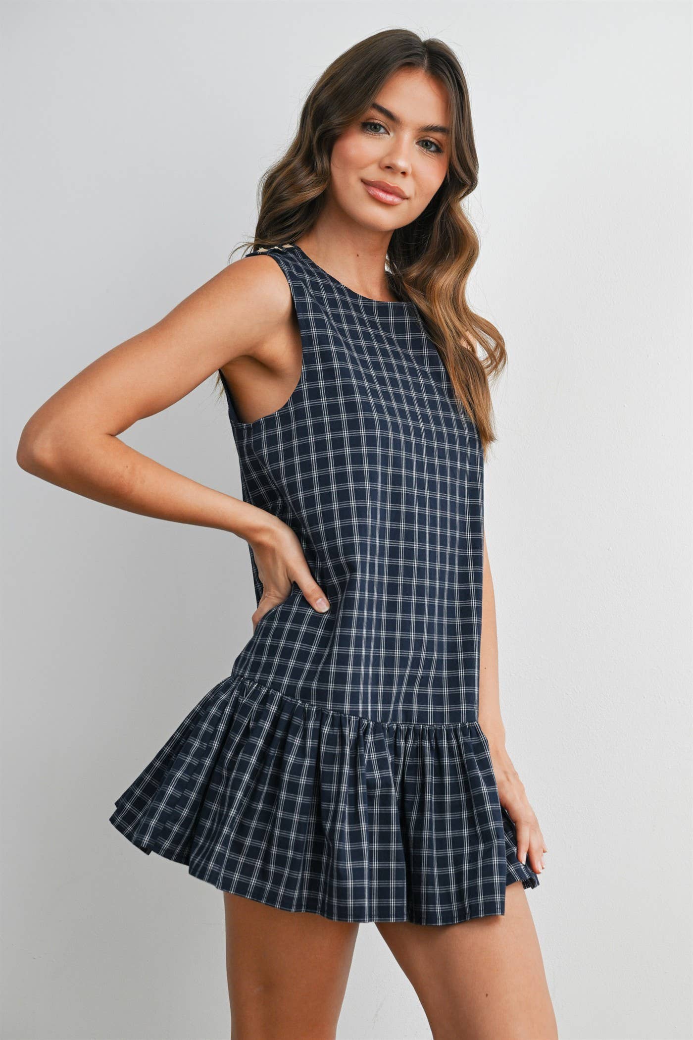 plaid mini dress, navy plaid dress, sleeveless plaid dress, button back dress, flounce hem dress, preppy plaid dress, fall mini dress, classic plaid dress, women's boutique dress, fall fashion, west of may boutique