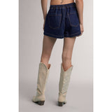 denim wrap skort, denim skort, women's denim skort, wrap front skort, cotton denim skort, mini skort, fall denim skirt, football game outfit, casual denim bottom, women's boutique skort, fall wardrobe staple, west of may boutique