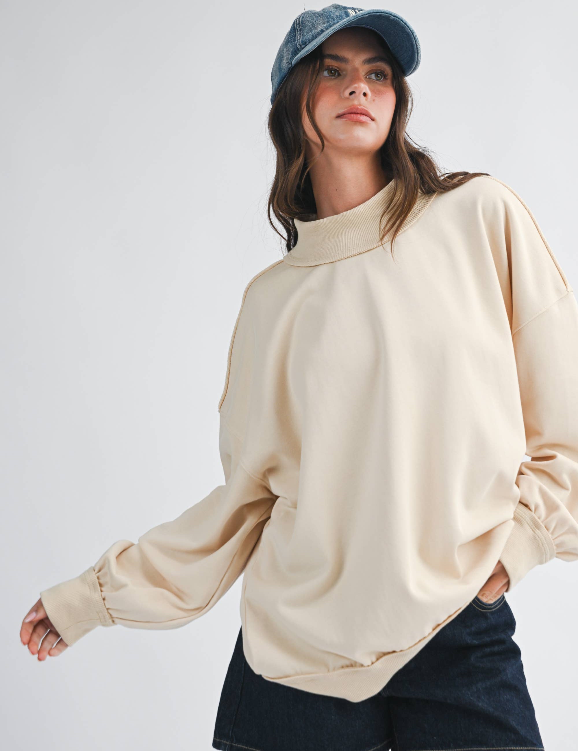 women's oatmeal cotton mock neck sweatshirt with oversized fit, drop shoulders, wide ribbed cuffs, and washed finish