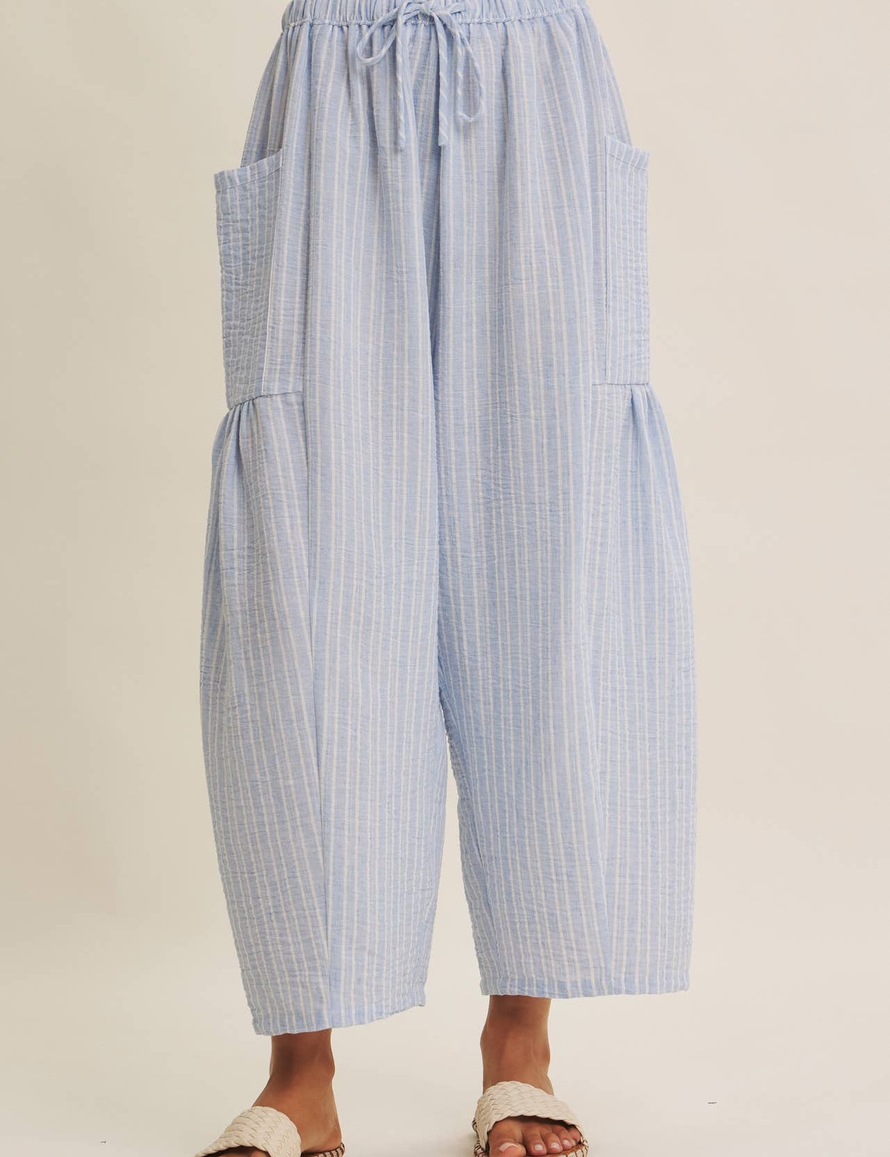 blue striped wide leg pants
coastal summer pants women
lightweight vacation pants
relaxed striped lounge pants
elastic waist wide leg pants
resort wear boutique pants
beach vacation outfit women
casual coastal style pants
striped summer trousers women
west of may spritz collection