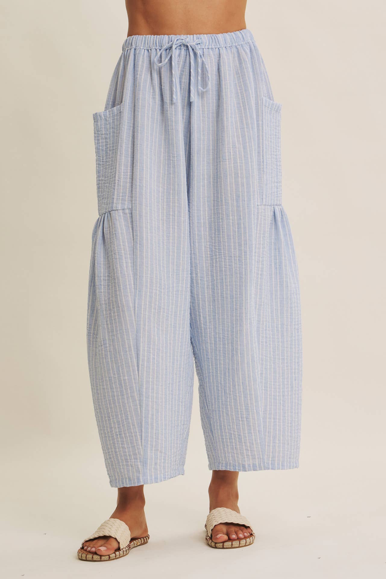 blue striped wide leg pants
coastal summer pants women
lightweight vacation pants
relaxed striped lounge pants
elastic waist wide leg pants
resort wear boutique pants
beach vacation outfit women
casual coastal style pants
striped summer trousers women
west of may spritz collection